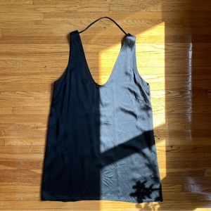 Black silk, short slip style dress. Low back.